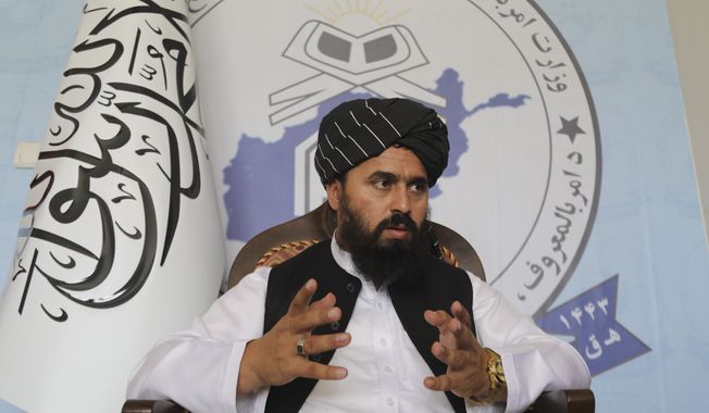 Molvi Mohammad Sadiq Akif, the spokesman for the Taliban&#x27;s Ministry of Vice and Virtue, speaks during an interview in Kabul, Afghanistan, Thursday, Aug. 17, 2023. Molvi said that women lose value if their faces are visible to men in public and that the only way to wear the hijab, or the Islamic headscarf, is if the face is hidden. (AP Photo/Siddiqullah Alizai)
