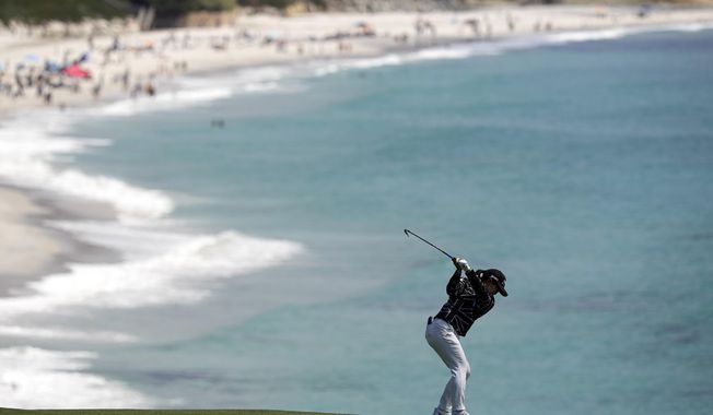 Nasa Hataoka, of Japan, hits from the ninth fairway during the final round of the U.S. Women&#x27;s Open golf tournament at the Pebble Beach Golf Links, Sunday, July 9, 2023, in Pebble Beach, Calif. (AP Photo/Darron Cummings)