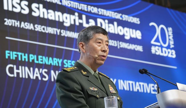 Chinese Defense Minister Gen. Li Shangfu delivers his speech on the last day of the 20th International Institute for Strategic Studies (IISS) Shangri-La Dialogue, Asia&#x27;s annual defense and security forum, in Singapore, Sunday, June 4, 2023. (AP Photo/Vincent Thian) ** FILE **