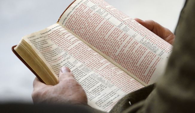 The Bible is read aloud at the Utah Capitol, Monday, Nov. 25, 2013. (Steve Griffin/The Salt Lake Tribune via AP) **FILE**