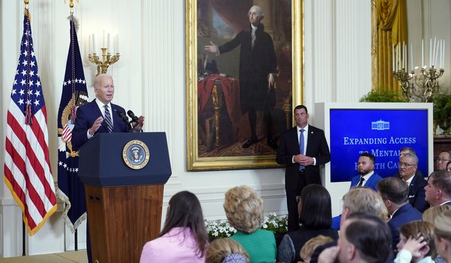 President Joe Biden speaks in the East Room of the White House in Washington, Tuesday, July 25, 2023, about proposed rules meant to push insurance companies to increase their coverage of mental health treatments. The rules, if finalized, would force insurers to study patient outcomes to ensure the benefits are administered equally, taking into account their provider network and reimbursement rates and whether prior authorization is required for care. (AP Photo/Susan Walsh)
