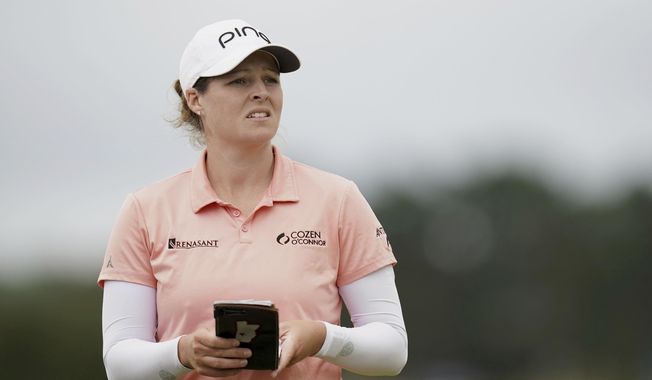 Ally Ewing of the USA on the 18th fairway during day two of the 2023 AIG Women&#x27;s Open at Walton Heath, in Surrey, England, Friday Aug. 11, 2023. (John Walton/PA via AP)