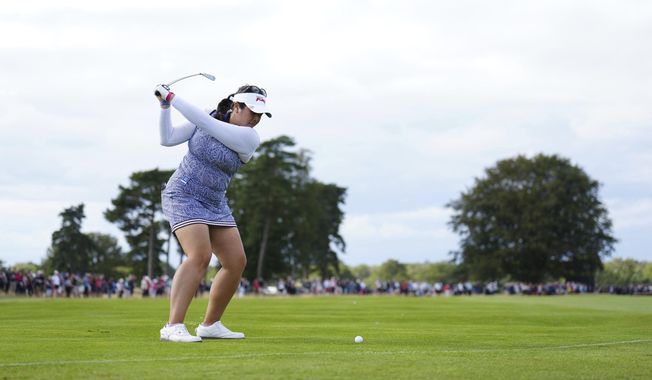 Lilia Vu of the US plays a shot on the eleventh fairway during day four of the 2023 AIG Women&#x27;s Open at Walton Heath, in Surrey, England, Sunday Aug. 13, 2023. (John Walton/PA via AP)