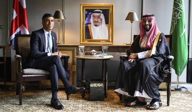 FILE - Britain&#x27;s Prime Minister Rishi Sunak, left, and Crown Prince Mohammed bin Salman of Saudi Arabia are seen during a bilateral meeting at the G20 Summit, Tuesday, Nov.15, 2022 in Nusa Dua, Bali, Indonesia. Britain’s prime minister said Thursday, Aug. 17, 2023 that he planned to meet with Saudi Crown Prince Mohammed bin Salman at the “earliest opportunity,’’ after a UK newspaper reported that officials from both countries hoped to schedule a meeting between the two leaders before the end of the year in London. (Leon Neal/Pool Photo via AP, FIle)