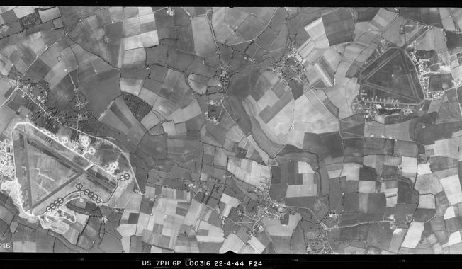 In this aerial photo released by the Historic England Archive taken by the United States Army Air Force, on April 24, 1944, a view of RAF Chalgrove (USAAF Station 465) and RAF Mount Farm (USAAF Station 234) in Oxfordshire, England. During World War II, specifically in 1943 and 1944, the U.S. Army Air Forces&#x27; photographic reconnaissance units captured the changing face of England, primarily around their bases in the south of the country. More than 3,600 of their black and white images were made available Wednesday, Aug. 16, 2023 in a free online, searchable map through the archive of Historic England. (Historic England Archive /USAAF Photography via AP)