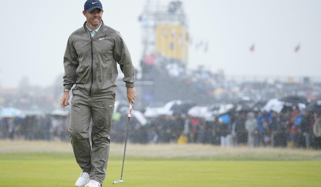 Northern Ireland&#x27;s Rory McIlroy reacts after putting on the 1st green during the final day of the British Open Golf Championships at the Royal Liverpool Golf Club in Hoylake, England, Sunday, July 23, 2023. (AP Photo/Jon Super)