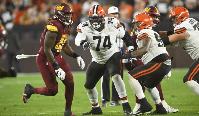 Cleveland Browns offensive tackle Dawand Jones (74) blocks during a preseason NFL football game against the Washington Commanders on Friday, Aug. 11, 2023, in Cleveland. Washington won 17-15. (AP Photo/David Richard)
