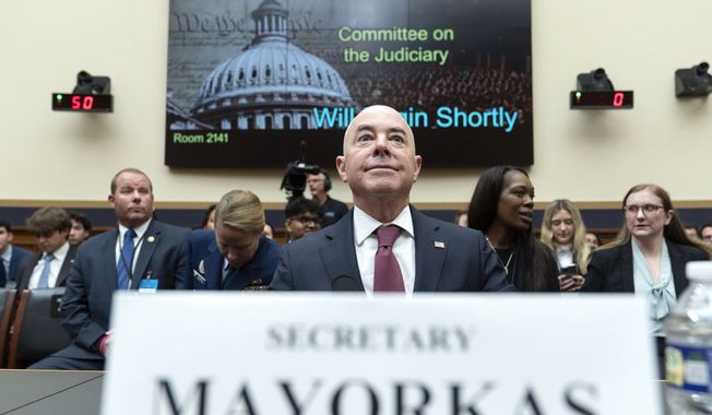 Homeland Security Secretary Alejandro Mayorkas arrives to testify before the House Judiciary Committee hearing on Oversight of the U.S. Department of Homeland Security on Capitol Hill in Washington, Wednesday, July 26, 2023. (AP Photo/Jose Luis Magana)