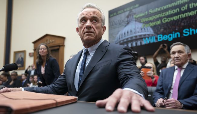 Democratic presidential candidate Robert F. Kennedy Jr., arrives to testify before the House Select Subcommittee on the Weaponization of the Federal Government, Thursday, July 20, 2023, on Capitol Hill in Washington. (AP Photo/J. Scott Applewhite)