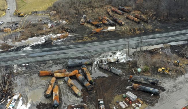 Cleanup of portions of a Norfolk Southern freight train that derailed Friday night in East Palestine, Ohio, continues on Feb. 9, 2023. (AP Photo/Gene J. Puskar, File)
