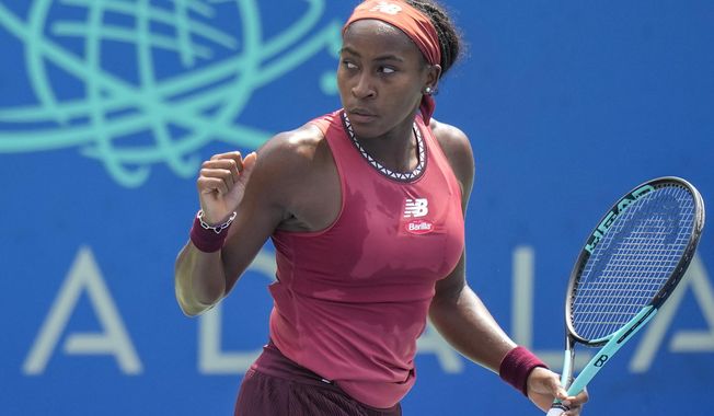 CORRECTS THAT SAKKARI IS FROM GREECE, NOT GERMANY - Coco Gauff, of the United States, celebrates after a point against Maria Sakkari, of Greece, during the women&#x27;s singles final of the DC Open tennis tournament Sunday, Aug. 6, 2023, in Washington. (AP Photo/Alex Brandon)