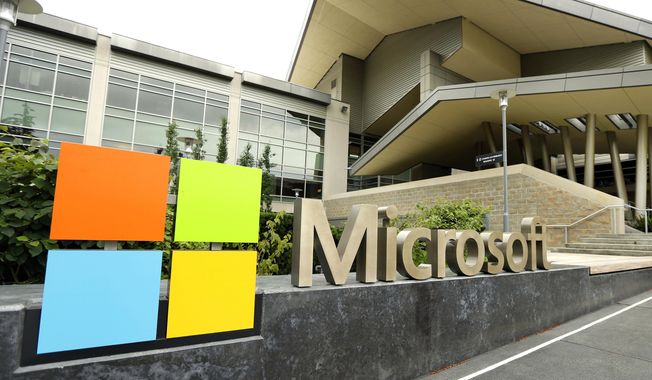 In this July 3, 2014, file photo, the Microsoft Corp. logo is displayed outside the Microsoft Visitor Center in Redmond, Wash. (AP Photo/Ted S. Warren, File)