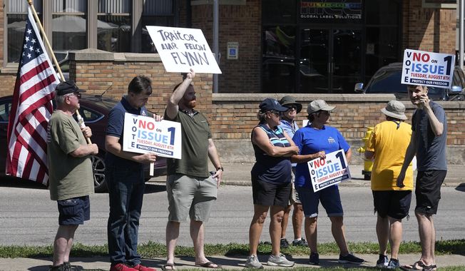 A small group of protesters gathers during a &quot;rosary rally&quot; on Aug. 6, 2023, in Norwood, Ohio. Turnout is robust and misinformation rampant as Ohio concludes a hastily called and highly charged special election Tuesday, a contest that could determine the fate of abortion rights in the state and fuel political playbooks nationally heading into 2024. (AP Photo/Darron Cummings) **FILE**