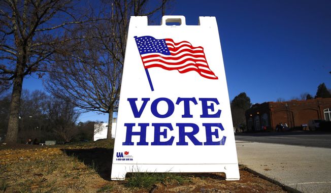 A &quot;Vote Here&quot; sign is seen outside a polling place during the 2020 South Carolina presidential primary on Feb. 29 in Columbia, S.C. (AP Photo/Matt Rourke, File)
