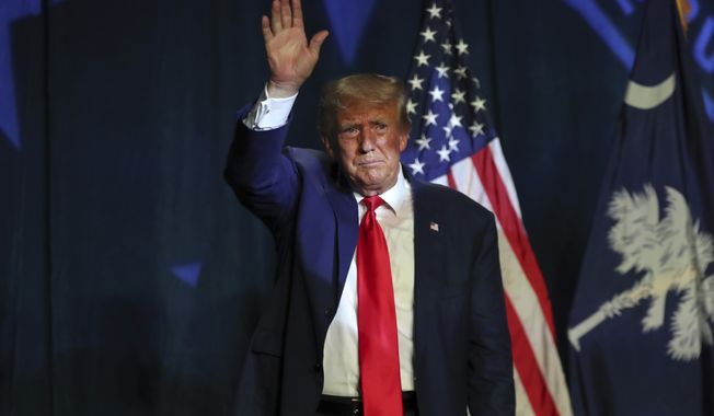 Former President Donald Trump waves after speaking at the 56th annual Silver Elephant Gala in Columbia, S.C., Saturday, Aug. 5, 2023. (AP Photo/Artie Walker Jr.)