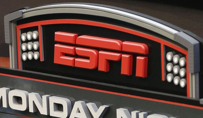 This Sept. 16, 2013, file photo shows the ESPN logo prior to an NFL football game between the Cincinnati Bengals and the Pittsburgh Steelers, in Cincinnati. Disney-owned ESPN has licensed its brand for use in a sports betting app, striking a deal in which it will receive $1.5 billion and other considerations from Penn Entertainment. The deal, announced Tuesday, Aug. 8, 2023 could take Walt Disney Co.-owned ESPN into uncharted waters.(AP Photo/David Kohl, File)