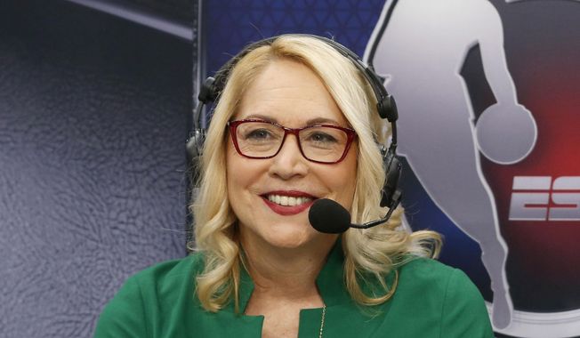 NBA ESPN announcer Doris Burke looks on before an NBA basketball game between the New Orleans Pelicans and the Dallas Mavericks in Dallas, March 4, 2020. ESPN let NBA analyst Mark Jackson go Monday, July 31, 2023, with two years remaining on his contract. With Jeff Van Gundy also being laid off in late June, ESPN is expected to replace them with Burke and Doc Rivers, people close to the move told The Associated Press. (AP Photo/Michael Ainsworth, File) **FILE**