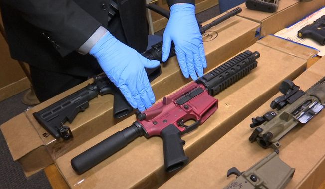 &quot;Ghost guns&quot; are displayed at the headquarters of the San Francisco Police Department in San Francisco, Nov. 27, 2019. A federal judge issued a court order Thursday, March 9, 2023, that immediately halts 10 gun distributors from selling or shipping gun parts and kits to New York — the types of materials officials say can be used to build untraceable ghost guns which can then be sold without background checks, eventually ending up in the wrong hands. (AP Photo/Haven Daley, File)