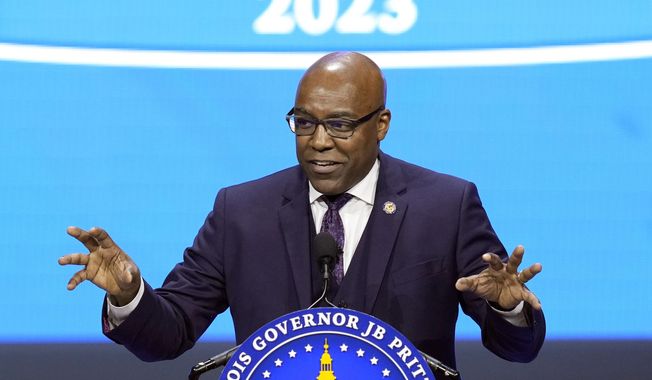 Illinois Attorney General Kwame Raoul delivers his remarks after being sworn to his second term as attorney general during ceremonies, Jan. 9, 2023, in Springfield, Ill. Illinois will soon outlaw advertising for firearms that officials determine produces a public safety threat or appeals to children, militants or others who might later use them illegally, as the state continues its quest to curb mass shootings. The prime exhibit in Raoul&#x27;s effort is the JR-15, advertised with the tag line, “Get ‘em One Like Yours.” (AP Photo/Charles Rex Arbogast, File)
