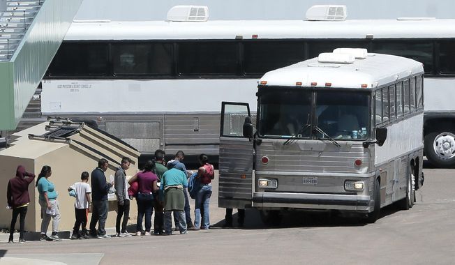 In this April 20, 2019 file photo, migrants are loaded onto a bus at the Border Patrol headquarters on Hondo Pass, in El Paso, Texas. Officials say Illinois will provide for a funeral and burial, Thursday, Aug. 17, 2023 for Jismary Alejandra Barboza González, the three-year-old migrant girl who died last week on a bus headed to Chicago from Texas. (Mark Lambie/The El Paso Times via AP, File)