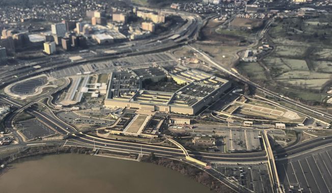 FILE - The Pentagon is seen in this aerial view in Washington, Jan. 26, 2020. The U.S. military academies must improve their leadership, stop toxic practices such as hazing and shift behavior training into the classrooms, according to a Pentagon study aimed at addressing an alarming spike in sexual assaults and misconduct. (AP Photo/Pablo Martinez Monsivais, File)