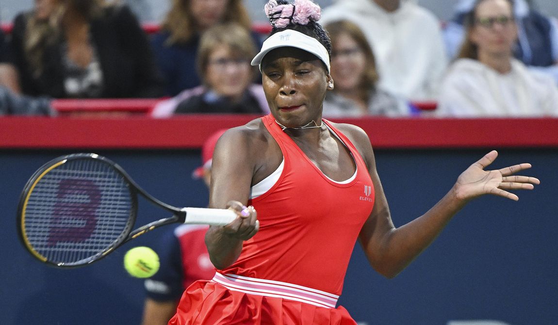 Venus Williams, of the United States, plays a shot during her women&#x27;s first-round match against Madison Keys, also of the United States, at the National Bank Open tennis tournament in Montreal, Monday, Aug. 7, 2023. (Graham Hughes/The Canadian Press via AP)