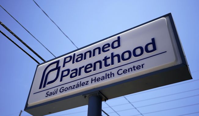 A Planned Parenthood sign is seen in Austin, Texas, Monday, Aug. 14, 2023. A federal judge who ordered restrictions on the abortion pill mifepristone will consider Tuesday, Aug. 15, whether Planned Parenthood must pay potentially hundreds of millions of dollars to the state of Texas over fraud claims. (AP Photo/Eric Gay)