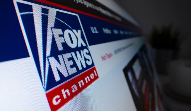 Close-up view of Fox News logo on its website. File photo credit: ymgerman via Shutterstock.
