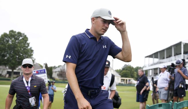 Jordan Spieth walks off the 18th hole after finishing the first round of the FedEx St. Jude Championship golf tournament at TPC Southwind in Memphis, Tenn., Thursday, Aug. 10, 2023. (Chris Day/The Commercial Appeal via AP)