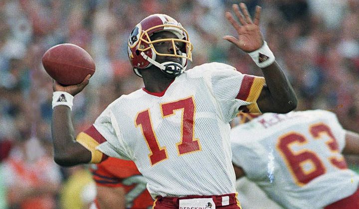 In this Jan. 31, 1988, file photo, Washington Redskins quarterback Doug Williams prepares to let go of a pass during first quarter of Super Bowl XXII against the Denver Broncos in San Diego. Brock Purdy&#x27;s bid to join the select group of quarterbacks to go from a backup for most of the season to a Super Bowl starter got derailed when he suffered his own injury in the NFC championship game. There have been several examples of backups leading a team to the big game. (AP Photo/Elise Amendola, File)