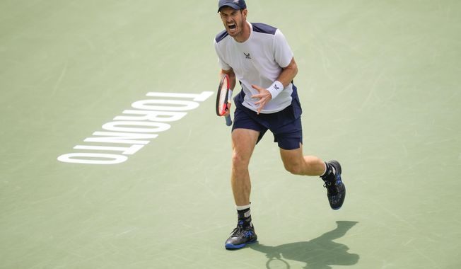 Britain&#x27;s Andy Murray celebrates against Italy&#x27;s Lorenzo Sonego at the National Bank Open men&#x27;s tennis tournament in Toronto, Tuesday, Aug. 8, 2023. (Mark Blinch/The Canadian Press via AP)