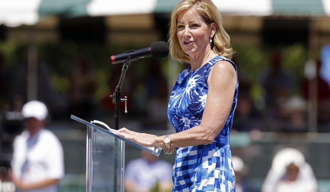FILE - Chris Evert speaks at the International Tennis Hall of Fame induction ceremony in Newport, Rhode Island, Saturday, July 12, 2014. Evert will receive the Serving Up Dreams Award on the first day of this year’s U.S. Open for her efforts to help the U.S. Tennis Association’s charitable arm. The USTA Foundation announced Wednesday, Aug. 9, 2023, that Evert will be honored at its gala on Aug. 28 in New York. (AP Photo/Michael Dwyer, File)