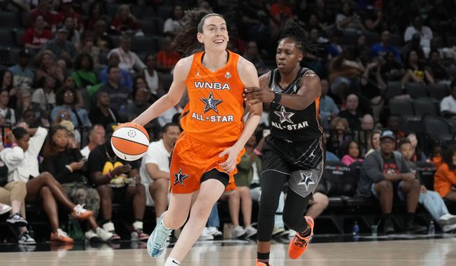 New York Liberty&#x27;s Breanna Stewart, of Team Stewart, drives around Las Vegas Aces&#x27; Chelsea Gray, of Team Wilson, during the second half of a WNBA All-Star basketball game Saturday, July 15, 2023, in Las Vegas. (AP Photo/John Locher)