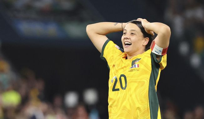 Australia&#x27;s Sam Kerr celebrates after scoring during a penalty shootout during the Women&#x27;s World Cup quarterfinal soccer match between Australia and France in Brisbane, Australia, Saturday, Aug. 12, 2023. (AP Photo/Tertius Pickard)